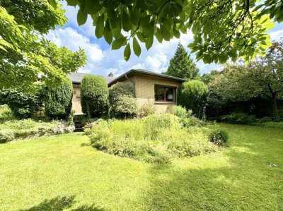 Wohnen auf einer Ebene - Ansprechender Bungalow mit schönem Garten in bevorzugter Lage