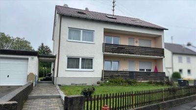 *Gepflegtes Mehrfamilienhaus mit Garten und Garage in ruhiger Lage*