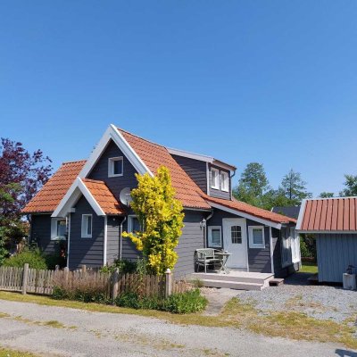 Traumhaftes Ferienhaus auf einem Doppelgrundstück am Uphuser Meer mit Wasserzugang zum Uphuser Meer