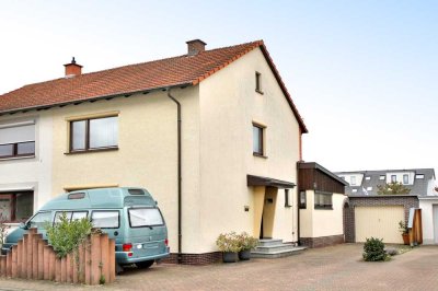 Gepflegte Doppelhaushälfte mit großem Garten und Garage in ruhiger Wohnlage