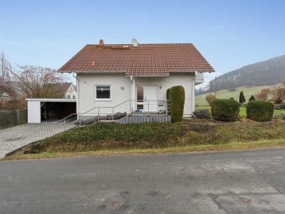 Ihr neues Zuhause: Familienidylle mit traumhaftem Ausblick in Hessisch Oldendorf