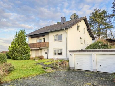 Hier wachsen Ideen: Zweifamilienhaus in Spitzenlage mit Ausbaureserve und Fernblick