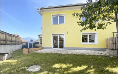 Familienparadies in Götzens: Wunderschöne 4-Zimmer-Wohnung im Reihenhausstil mit Garten