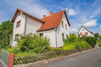 Familienfreundliches Einfamilienhaus mit großem Garten und Garage