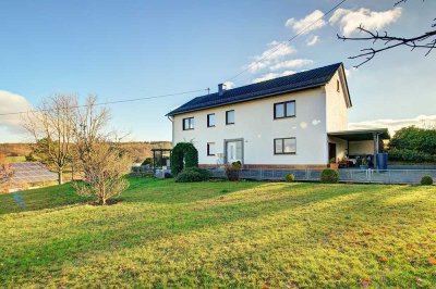 Teilvermietetes Zweifamilienhaus mit hübschem Garten in herrlicher Wohn- und Aussichtslage!