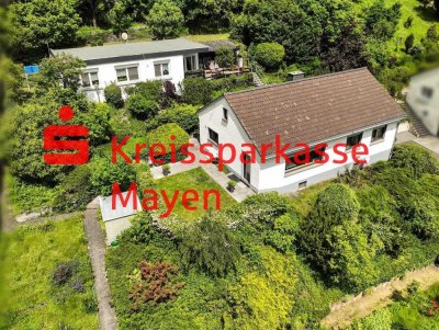 Gepflegtes Wohnhaus u. separates, vermietetes EFH m. 3 Garagen u. Garten