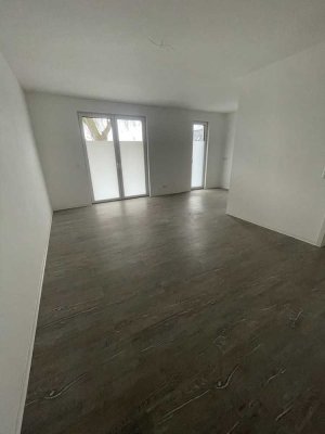 Wohnen mit WBS! Neubau 2022! ebenerdige 2-Zimmer-Wohnung mit Terrasse, Duschbad und HWR