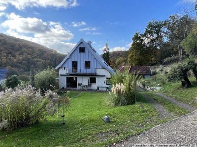 Wohnhaus mit zusätzlichen Gewerbenutzflächen und großem Grundstück mit Fernsicht