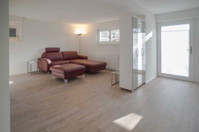 Ruhige und moderne 1,5-Zimmer-Wohnung mit Einbauküche, Terrasse und Carport/Schopf