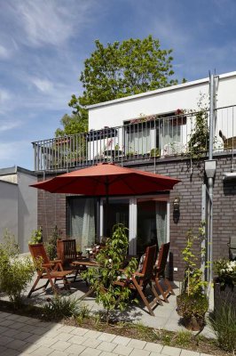 Wohnen am Rochuspark: Modernes Townhouse mit zwei Terrassen in ruhiger Innenhoflage