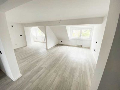 Dachgeschosswohnung: Energieeffizient, Barrierefrei, mit Balkon und Garage für modernes Wohnen