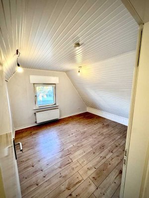 Freundliche und modernisierte 4-Zimmer-Wohnung mit Terasse und Garten in Herzogenrath-Merkstein