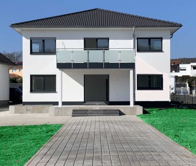 Neubau, Erstbezug, 4-Zimmer-Wohnung mit Balkon, (KfW 55-Haus) in Lich bei Gießen - max. 3 Personen