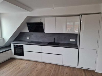 Erstbezug mit Dachterrasse und Einbauküche: Exklusive 3-Zimmer-DG-Wohnung in Heiligenhafen