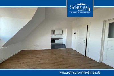 3-Zimmer-Dachgeschosswohnung mit Einbauküche im modernisierten Altbau