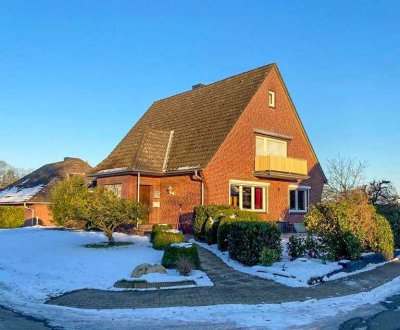 Erdgeschosswohnung mit großem Garten und Garage