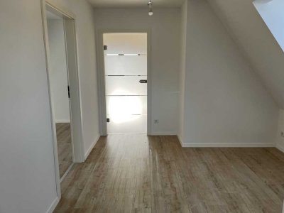 Exklusive 3-Zimmer-DG-Wohnung mit Balkon und Garten in Glashütten