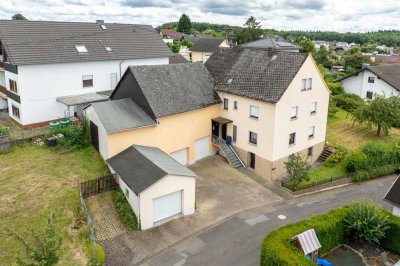 Großzügiges Wohnhaus mit Garten und Garagen - Vielseitige Nutzungsmöglichkeiten und Ausbaupotenzial!