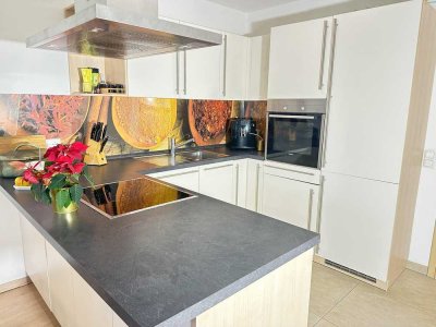 Moderne Erdgeschosswohnung mit großem Garten