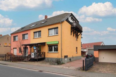 Kleines Wohn- und Geschäftshaus voll vermietet mit Garten und großer Garage