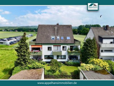 Großzügige Dachgeschosswohnung mit zwei Balkonen und Blick ins Grüne!