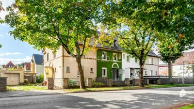 Familiengerechtes Reihenendhaus mit 5 Zimmern und Garten in renovierungsbedürftigem Zustand