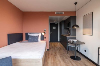 Coliving, furnished apartments with community spaces, coworking and gym