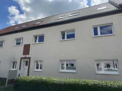 Vermietete Wohnung mit Balkon und eigenem Garten zum Verkauf