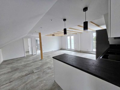 Exklusive Dachgeschosswohnung im Loft Stil mit großem Balkon und Aussicht ins Grüne 70 m²