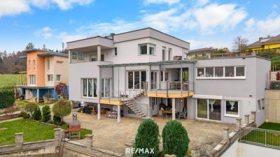 Exklusives Ein-/Mehrfamilienhaus in idyllischer Lage: Ihr neues Zuhause mit Charme und Ausblick