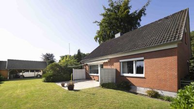 Charmantes Einfamilienhaus mit großzügigem Garten und Carport zur Vermietung