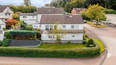 Charmantes Hybrid-Einfamilienhaus mit Garten, Terrasse, Balkon und Garage in idyllischer Lage