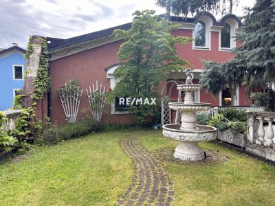 Erstklassige Maisonette-Wohnung mit Dachterrasse und Garten