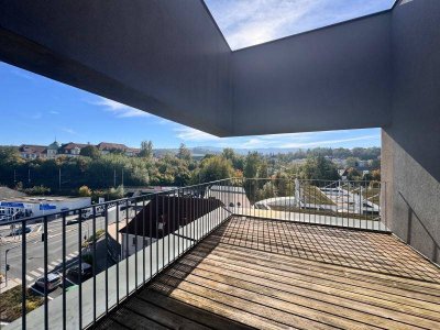 Einzigartige Dachterrassenwohnung in Zentrumslage mit Stadt- und Bergausblick