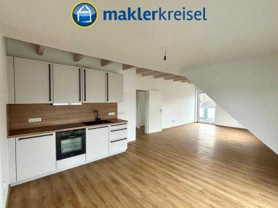 Neubau in ruhiger Lage: Dachgeschosswohnung mit 3 Balkonen nach Kfw-55 Standard und mit Wärmepumpe!