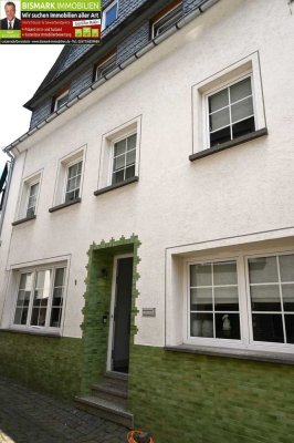 Haus mit 4 top Ferienwohnungen und mehreren Terrassen.