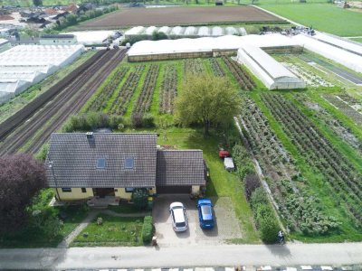 Grünes Paradies: Idyllisches Familienhaus mit großem Garten und Potenzial für Einliegerwohnung