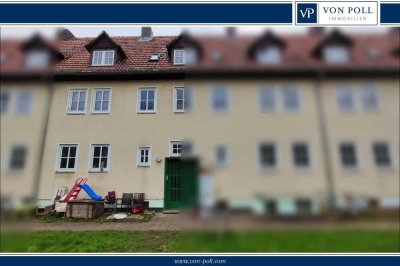 Eine Hälfte des Mehrfamilienhaus mit sechs Wohneinheiten