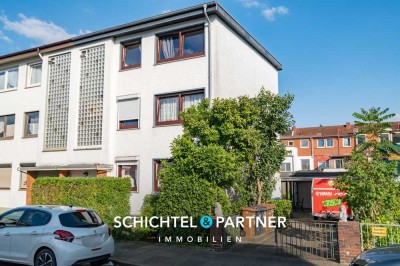 Huckelriede | Gepflegtes 3-Parteienhaus mit Garten und Garagen in Top-Lage