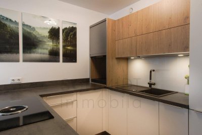 Moderne möblierte Wohnung in St. Johann: 71m², Loggia, Garage, top Ausstattung - jetzt für € 1.600.- mieten!