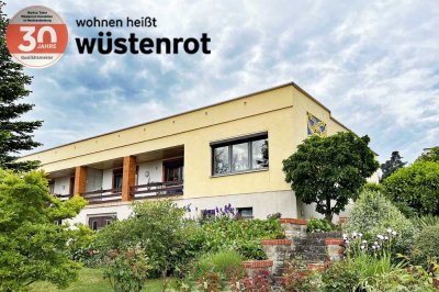 GROSSZÜGIGES WOHNEN AUF EINER EBENE MIT ÜBERDACHTEM BALKON + AUSGEBAUTEM UNTERGESCHOSS + TIEFGARAGE