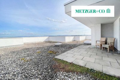 Lichtdurchflutete 3,5-Zimmer-Wohnung mit Dachterrasse und Pool