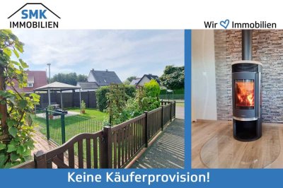 Ideal für jede Jahreszeit: Eigentumswohnung mit Gartenanteil und Kamin!