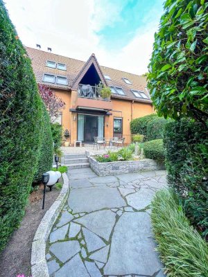 Traumhafte Maisonette-Wohnung mit Hauscharakter: Ein Zuhause mit Garten und Gemeinschaftsspielplatz