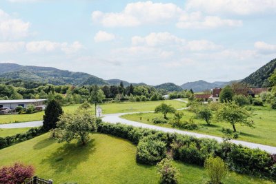 Idyllisches Wohnen: Helle Wohnung mit Tiefgaragenstellplatz und Ausblick ins Grüne!