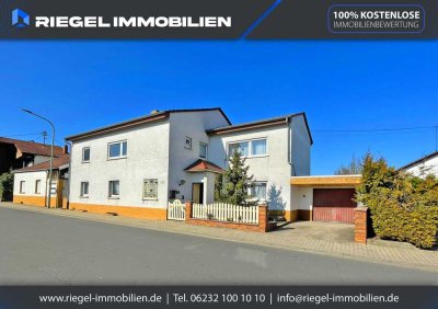 Sie hier? Wir auch! Großzügiges 2 Familienhaus mit jeweils 4 Zimmern, 2 Küchen, 2 Bädern und Garage