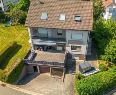 Großzügige Erdgeschosswohnung mit Terrasse und Hobbyraum