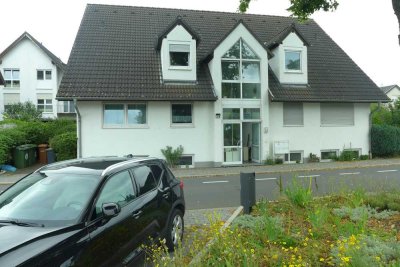 IN UNKEL : SCHÖNE ERDGESCHOSSWOHNUNG MIT 2 - ZKB , TERRASSE, GARTEN UND TIEFGARAGENPLATZ