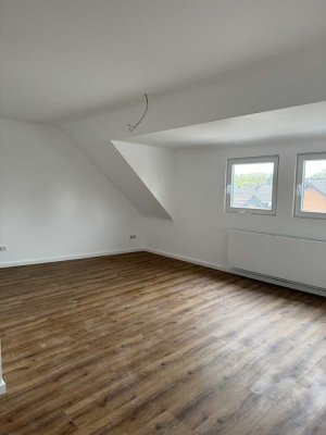 **Gemütliche Dachgeschosswohnung mit modernem Wohnkonzept**