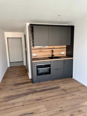 Luxuriöses Neubau-Apartment mit Einbauküche und Balkon